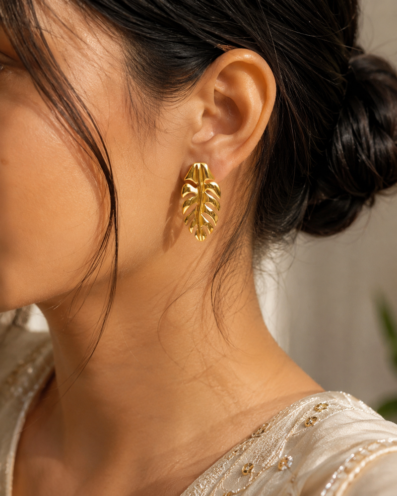 Buy Designer Golden Tropical Leaf Stud Earrings